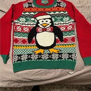 Ugly Christmas sweater penguin-themed sweater